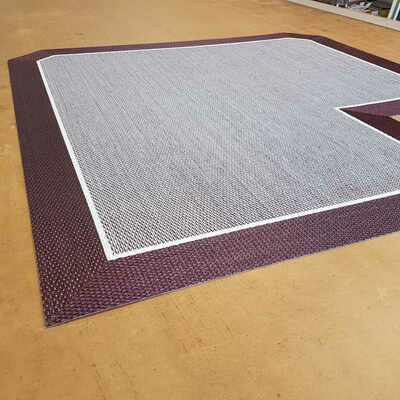 ALFOMBRA DE PVC A MEDIDA ACABADO CENEFA