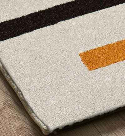 ALFOMBRA GEOMÉTRICA LESSIA LÍNEA NARANJA Y NEGRO