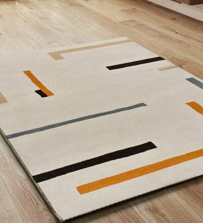 ALFOMBRA GEOMÉTRICA LESSIA LÍNEA NARANJA Y NEGRO